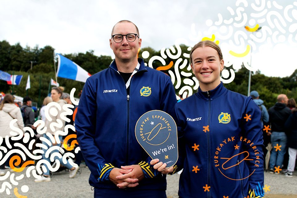 Two representatives of Skellefteå Kanotklubb holding a 'EuroKayak Experience — We're in!' sign.
